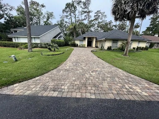 A long paver driveway after cleaning
