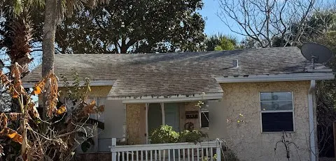 Before: One-story shingle roof