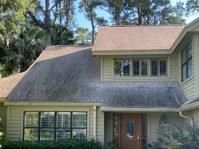 Before: Two-story shingle roof