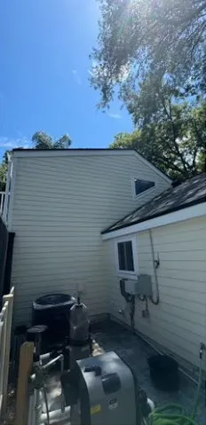 After: Siding by the AC unit
